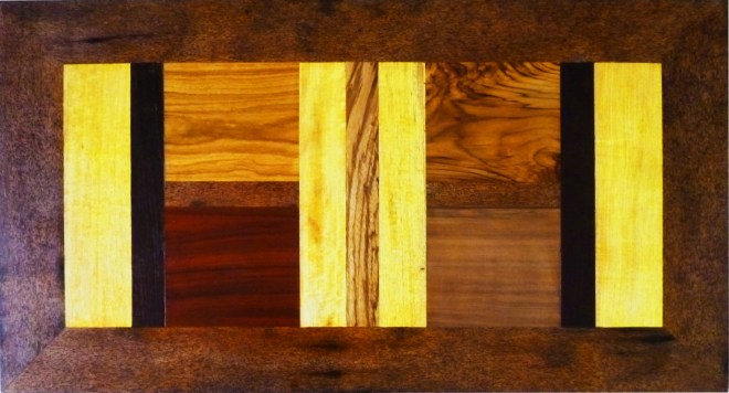 table basse coralie L 110 X P 60 X H 40. 9 essences de bois précieux : ronier, veine, bété, wengué, zingana, padouk, teck, movingué